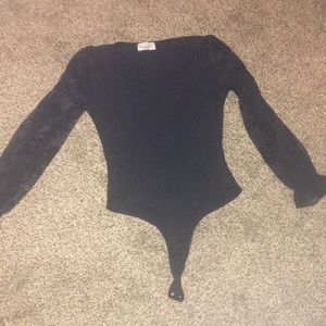 Black body suit.